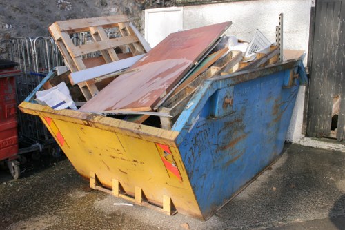Professional office clearance team removing furniture in Camden Town